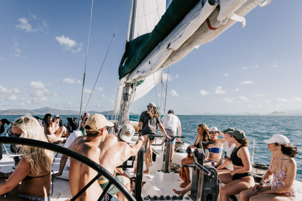 Professional videography group enjoying a sunny boat trip