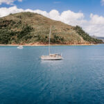 Professional videography sailing boats on blue ocean waters