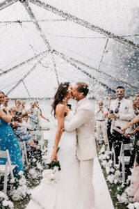 Professional videography photography drone footage wedding kiss