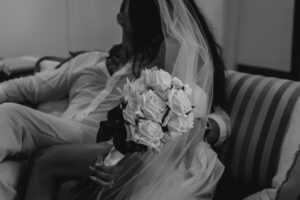 Professional videography bride holding bouquet in elegant setting