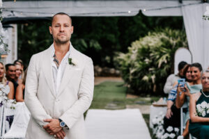 Professional videography and photography at outdoor wedding event