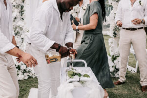 Professional videography of a cheerful outdoor wedding toast
