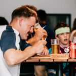 Professional videography at a lively social event in a bar