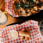 Professional videography dining shots with drinks and appetizers
