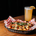 Professional videography photography and drone footage of food and drink on wooden table