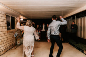 Professional videography of a lively wedding dance party scene