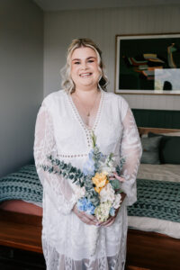 Professional videography photography and drone footage bride smiling