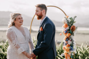 Professional videography capturing a joyful outdoor wedding ceremony