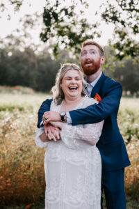 Professional videography photography drone footage of wedding couple