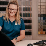 Professional videography customer consultation in an office setting