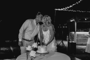Professional videography capturing a couple kissing at a wedding