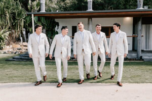 Professional videography expertise capturing groomsmen in suits