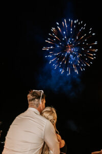 Professional videography capturing a couple watching fireworks