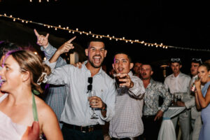 Professional videography at lively outdoor evening event