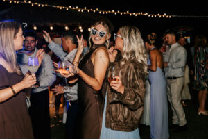 Professional videography captures lively outdoor celebration atmosphere