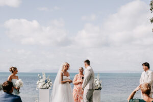Professional videography photography drone footage of beach wedding