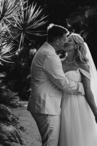Professional videography of romantic wedding couple in garden setting