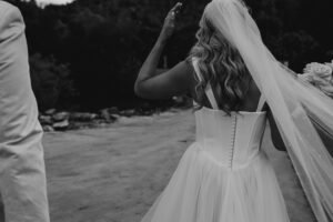 Professional videography of elegant bride walking outdoors