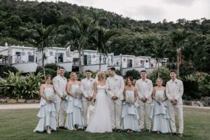 Professional videography wedding party outdoors lush greenery