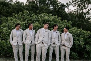 Professional videography and photography of groomsmen outdoors