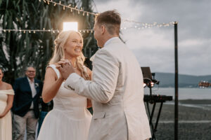 Professional videography couple dancing elegantly at wedding