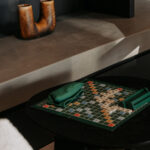 Professional videography, photography, and drone footage of Scrabble game on modern table