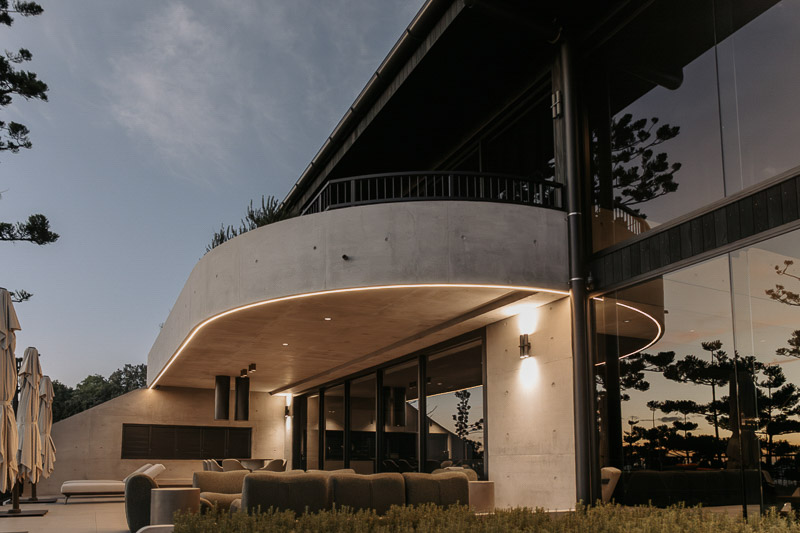 Fortunato’s curved exterior and outdoor entertaining area photographed by TDM on Hamilton Island