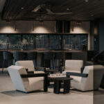 Professional videography in modern lounge with stylish seating