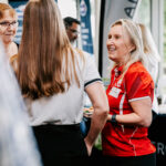 Professional videography networking event with people conversing