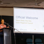 Professional videography event with speaker and presentation screen