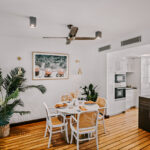 Dining table and kitchen at 208 Boathouse