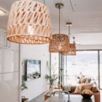 Woven pendant lights above the kitchen at 208 Boathouse