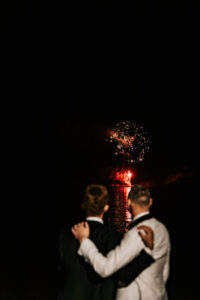 Professional videography capturing a couple watching fireworks