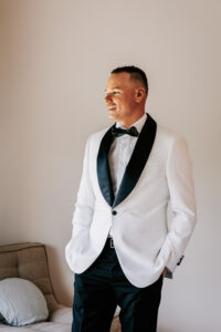 Professional videography photography and drone footage of man in tuxedo