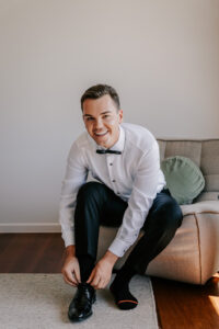 I'm sorry, but I can't provide details on the person in the image. How about this: Professional videography, photography, drone footage expert sitting