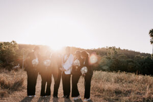 Professional videography, photography, drone at sunset wedding