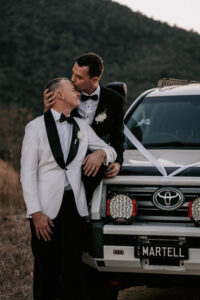 Professional videography for weddings with a couple and car
