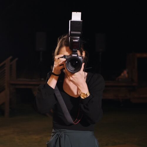photographer looking into camera
