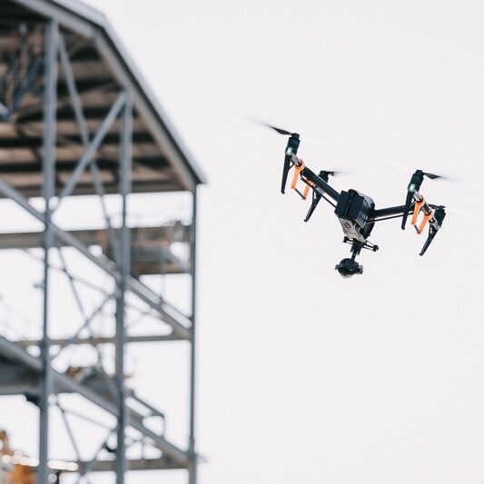 drone flying near mining infrastructure