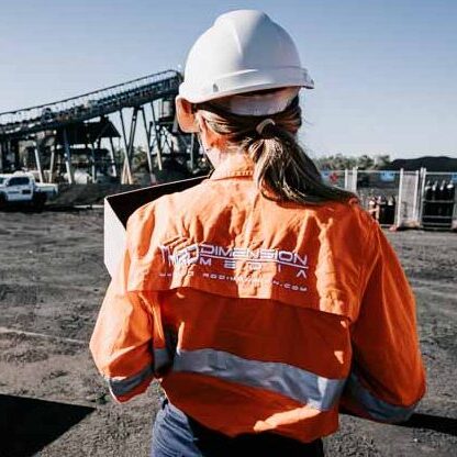 TDM Mining 05-23 -3 Drone operator in hi-vis with hard hat on mine site